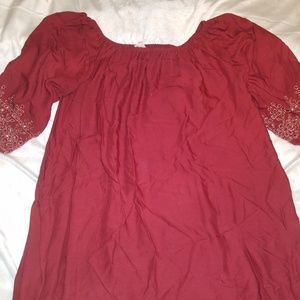 Knee length off the shoulder dress.